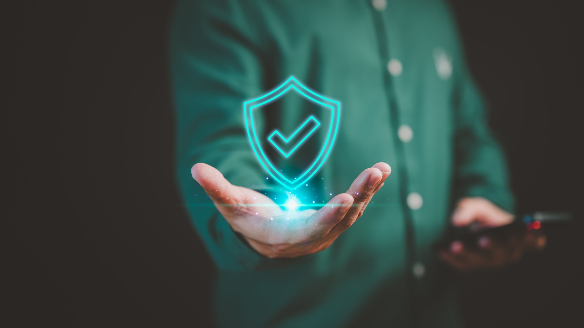 User show symbol on hand with identity proof icon for cyber security protection system on virtual screen. Technology warranty concept for consumer confidence and business service, certified guarantee.